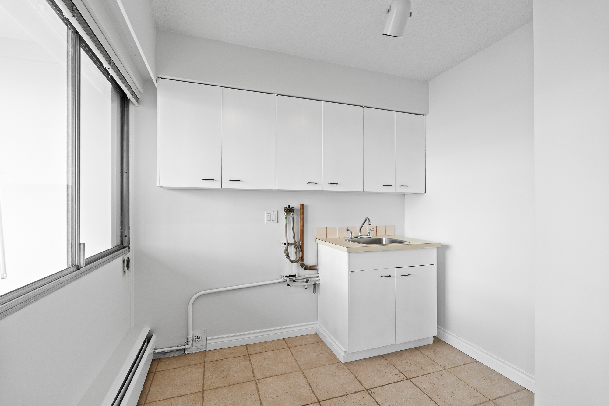 #203 - 150 24th Street